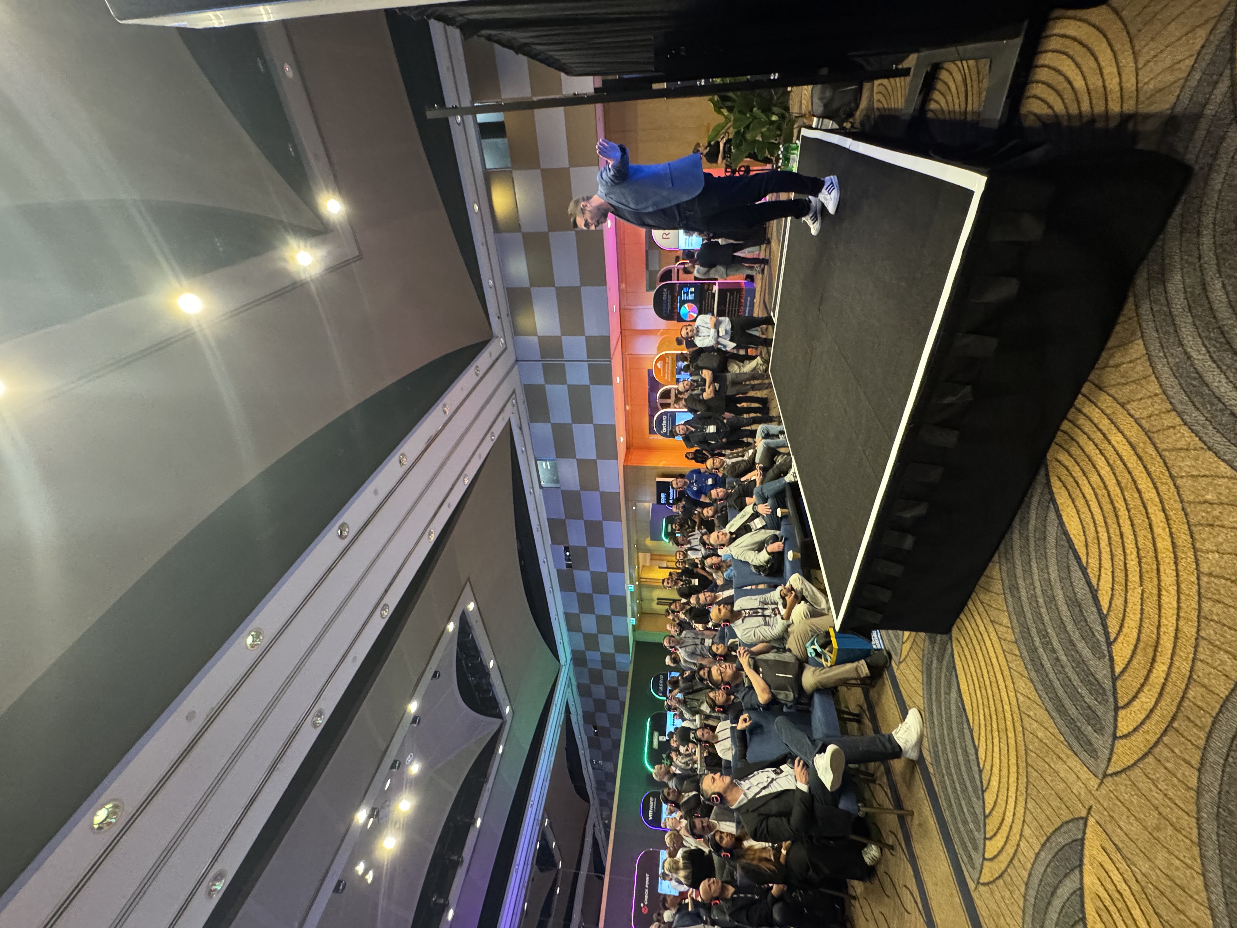 Andrew Riley presenting to an audience